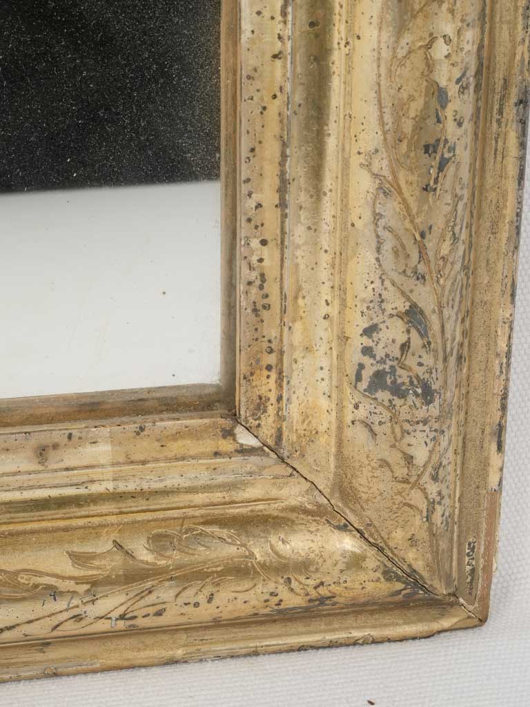 Intricate silver gilded vintage mirror