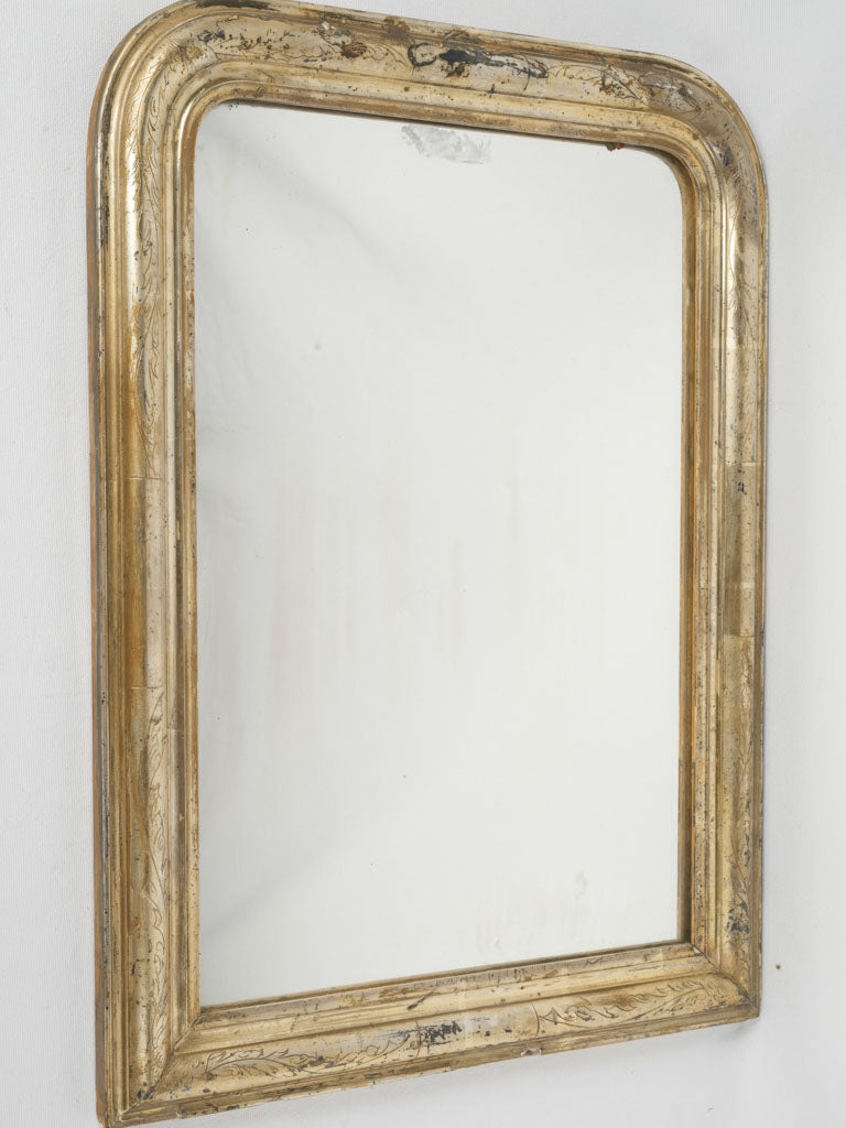 Delicate vintage silver floral wall mirror