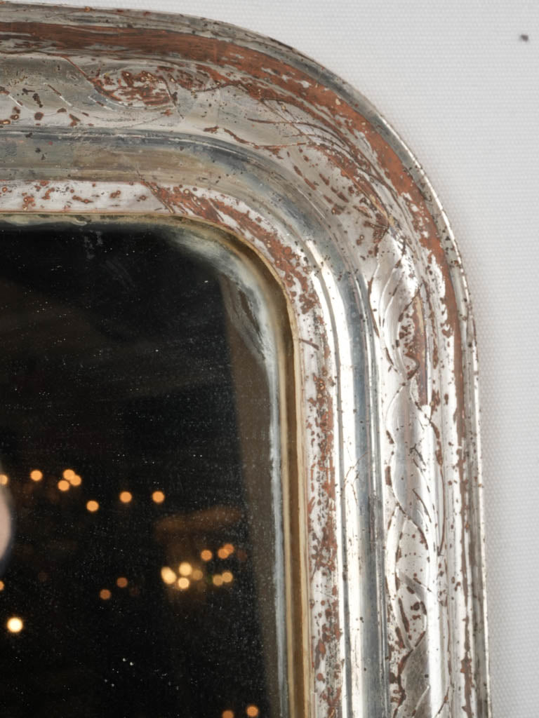 Aged, subtle floral Louis Philippe mirror