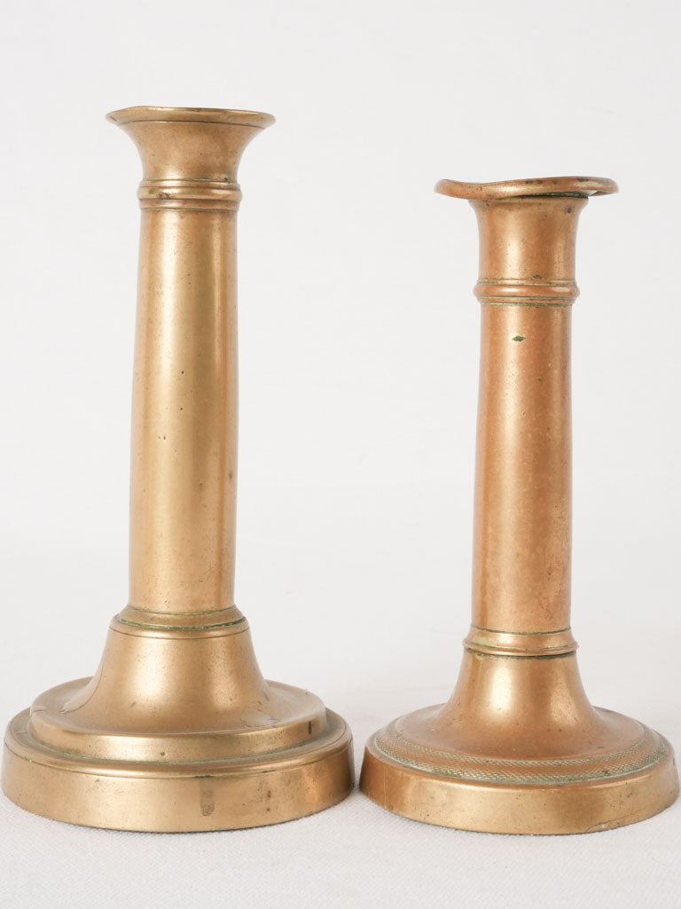 Elegant aged brass table candlesticks