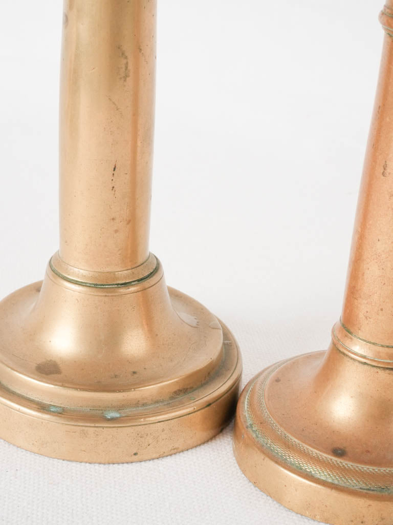 Ornate nineteenth-century brass candlesticks