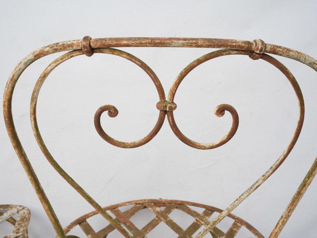 Timeless iron heart-back garden chairs