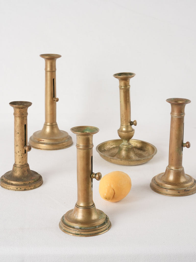 Antique brass Napoleonic candlestick collection