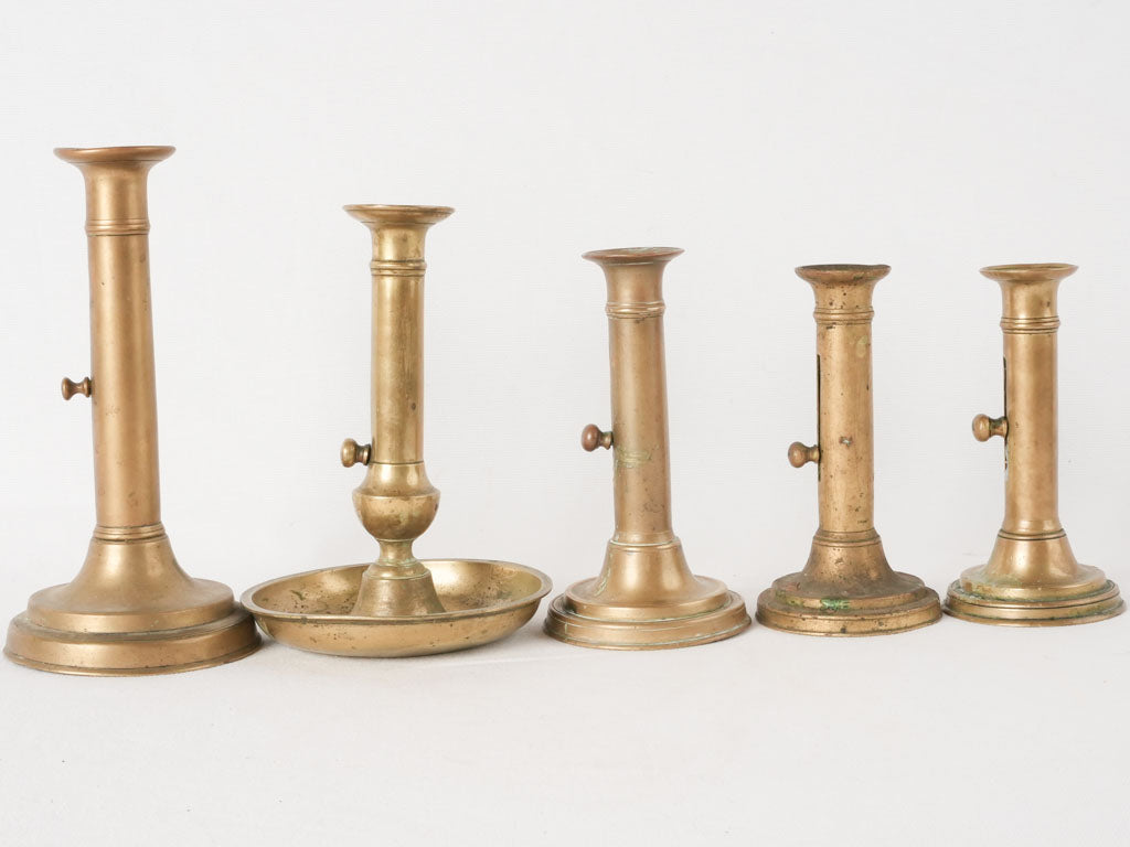 Aged patina brass candlestick set