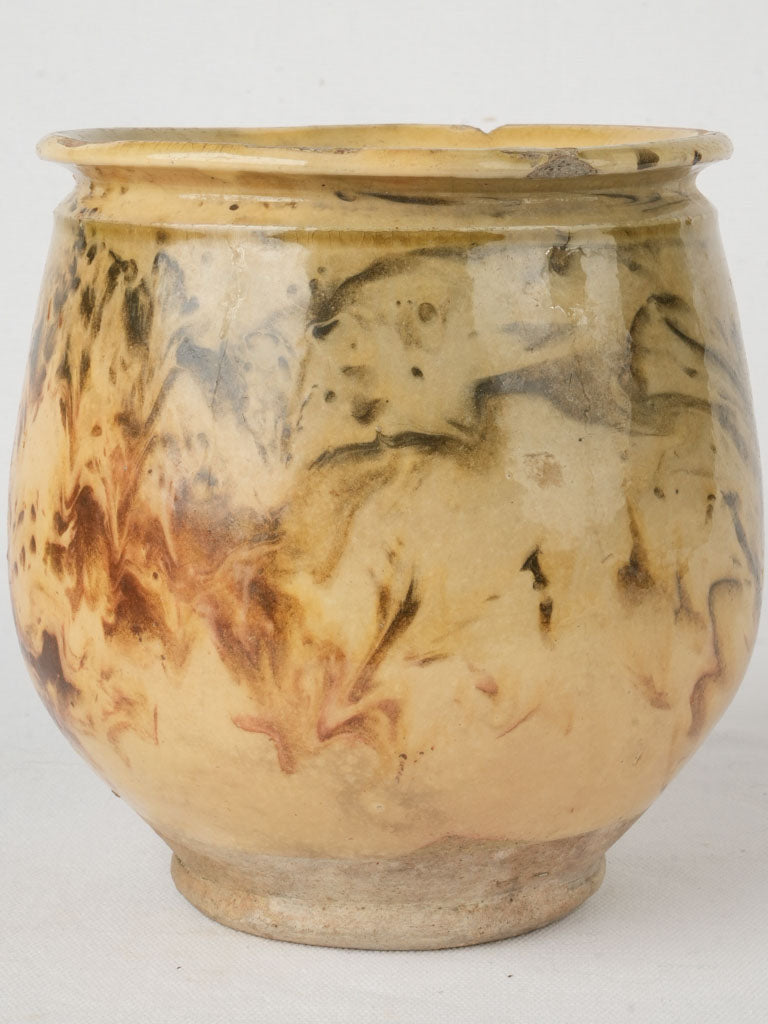 Earthen marbled honey pottery vessel