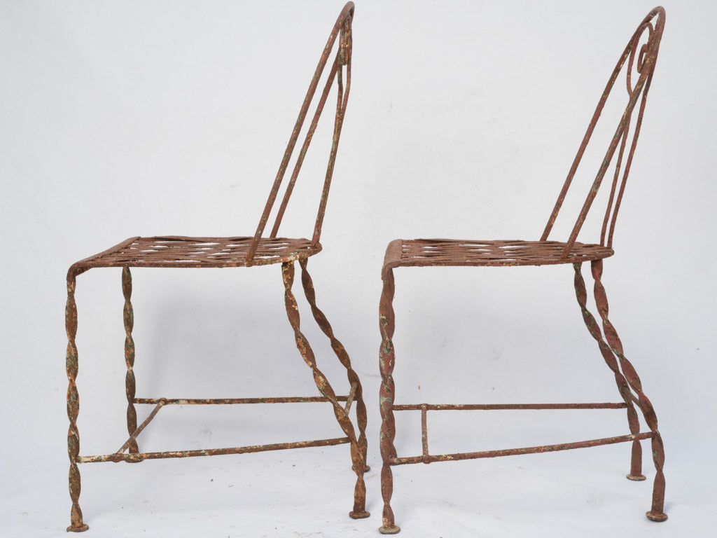 Aged French iron garden chairs