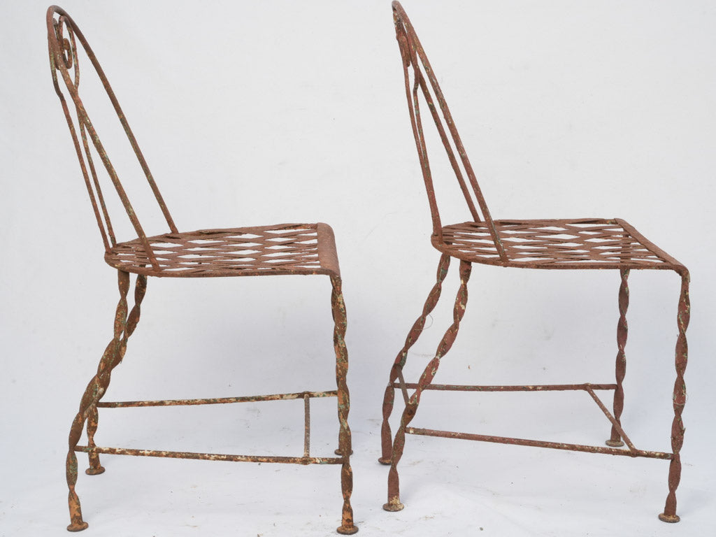 Patina-finished French garden chairs