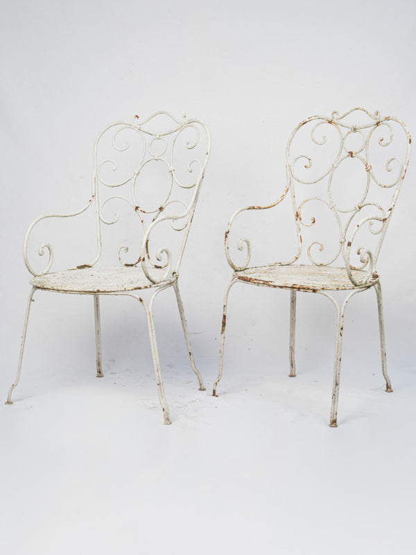 Vintage, wrought iron garden armchairs