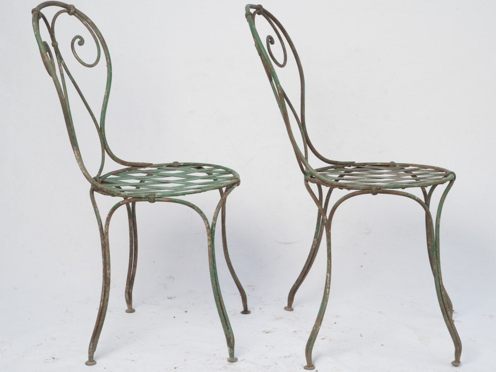 Patina-finished French garden seats