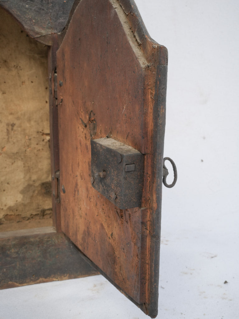 Antique, timeworn oratory wooden cabinet