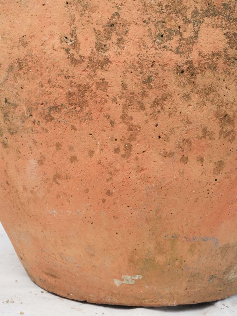 Aged ocher terracotta storage jar