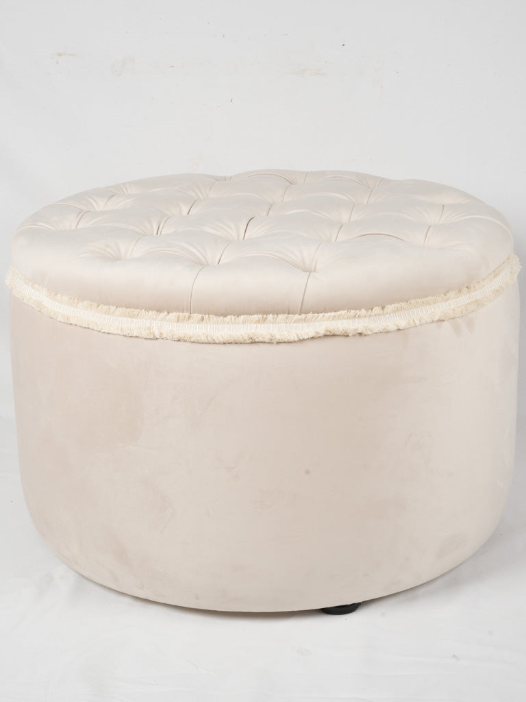 Elegant reupholstered beige Fringed ottoman