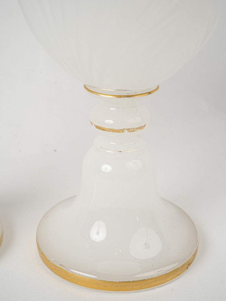 Delicately molded opaline glass vases  