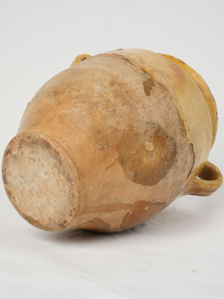 Aged and weathered French earthenware confit pot