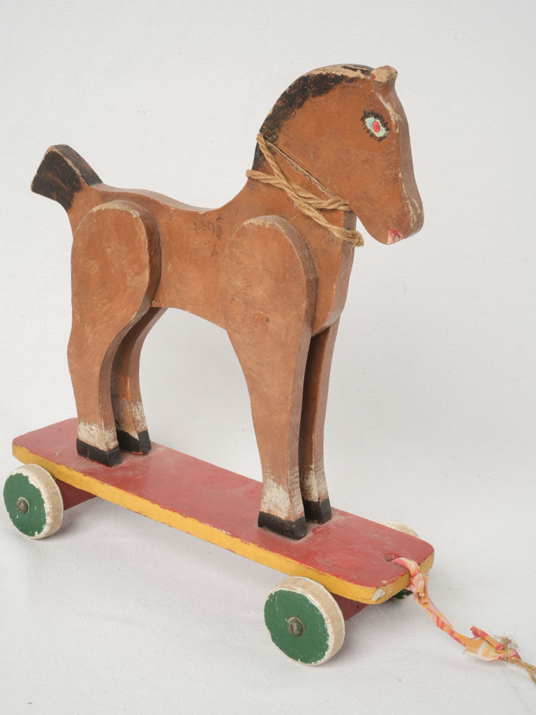 Vintage handcrafted wooden pull-along toy