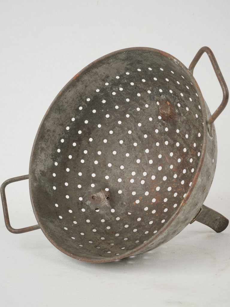 Time-worn, French fruit colander