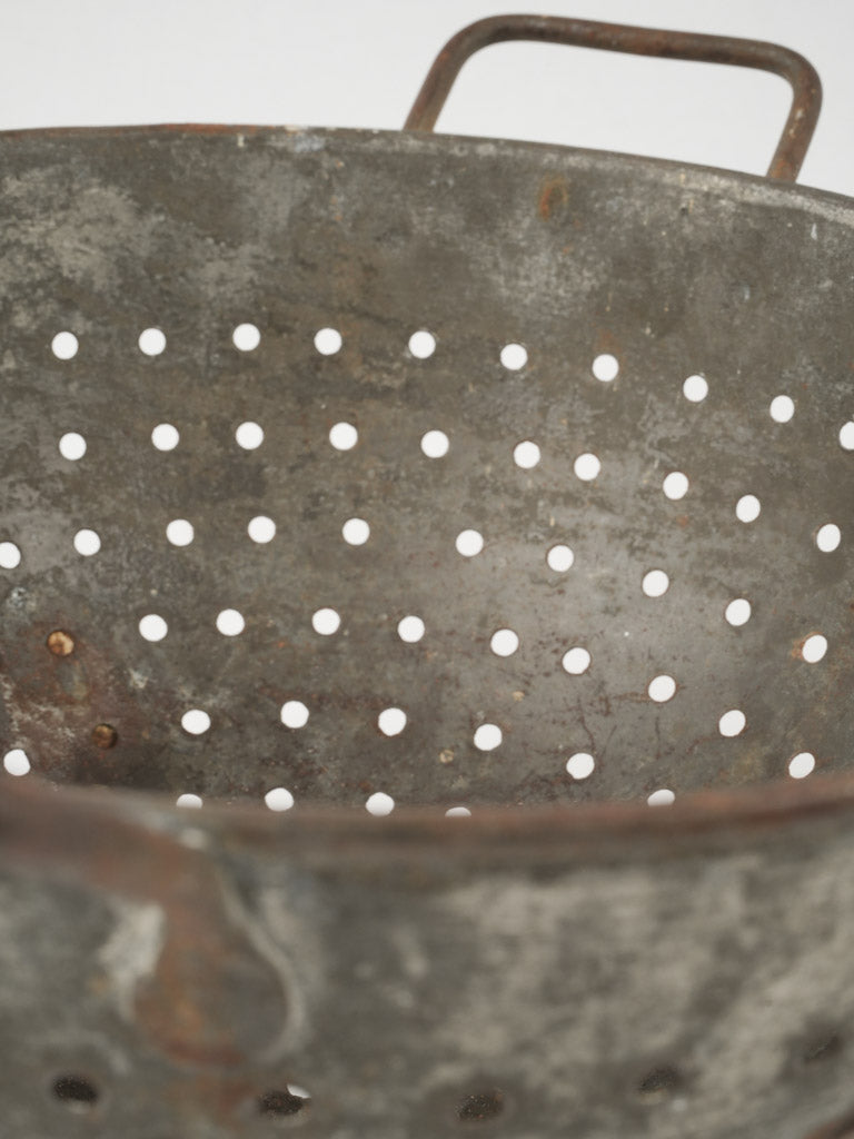 Provencal, tarnished kitchen strainer