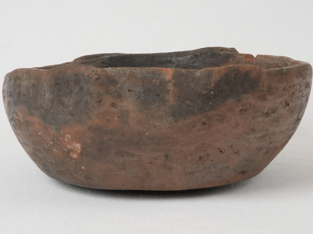 Aged traditional French terracotta kitchen bowl