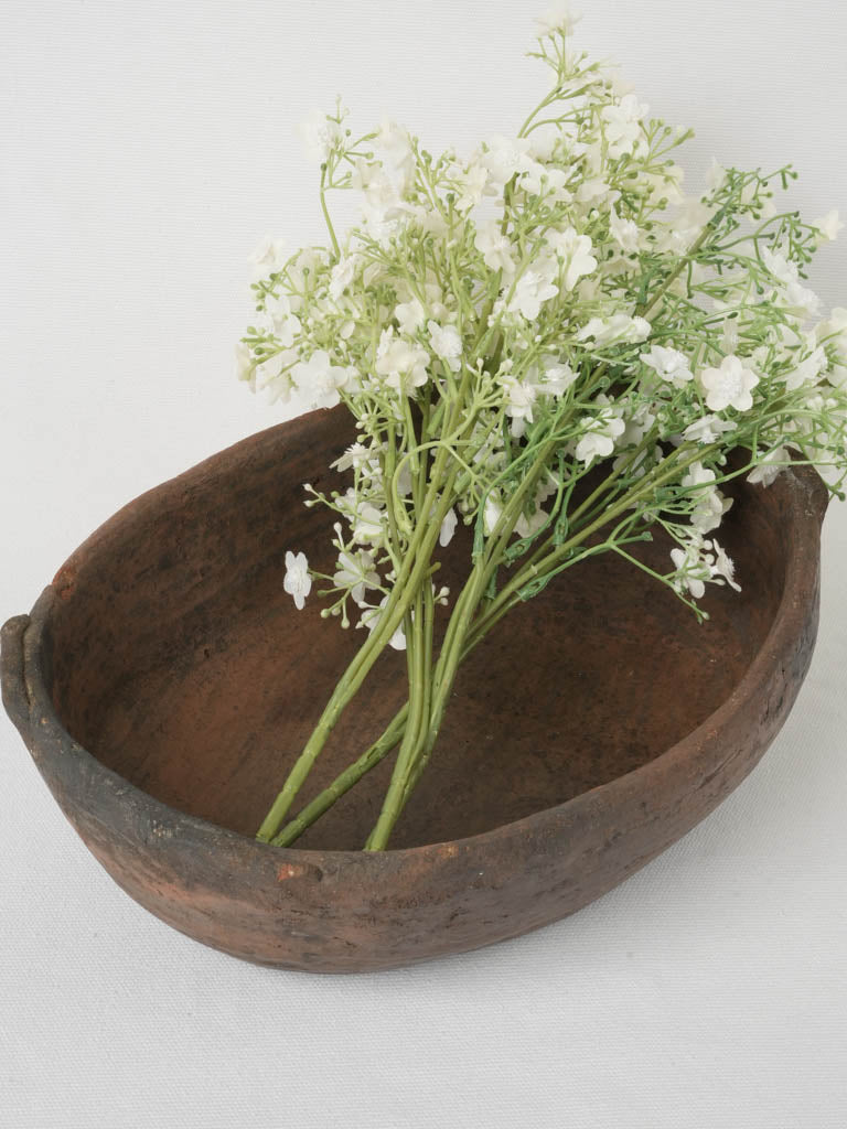 Characteristic 19th-century terracotta oval bowl