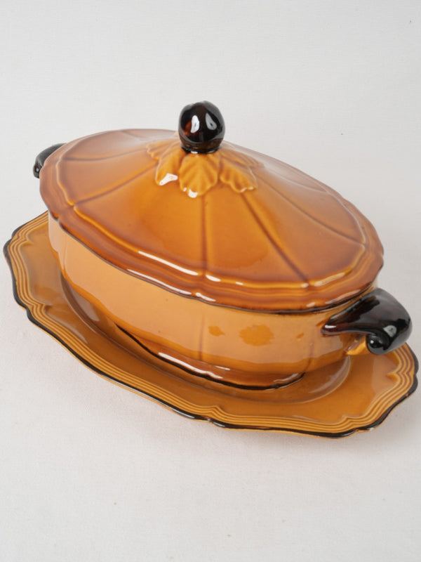 Provencal artisanal ocher tureen showcasing