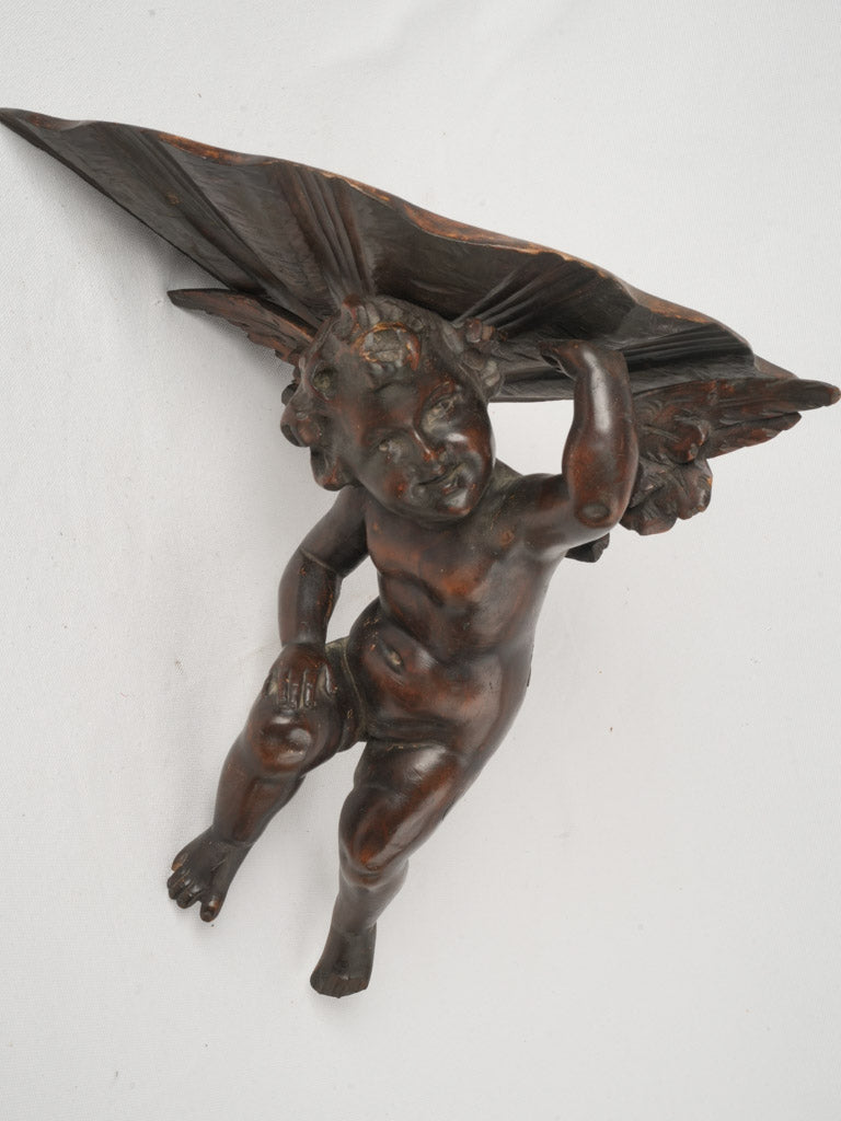 Elaborate 19th-century cherub shelf  