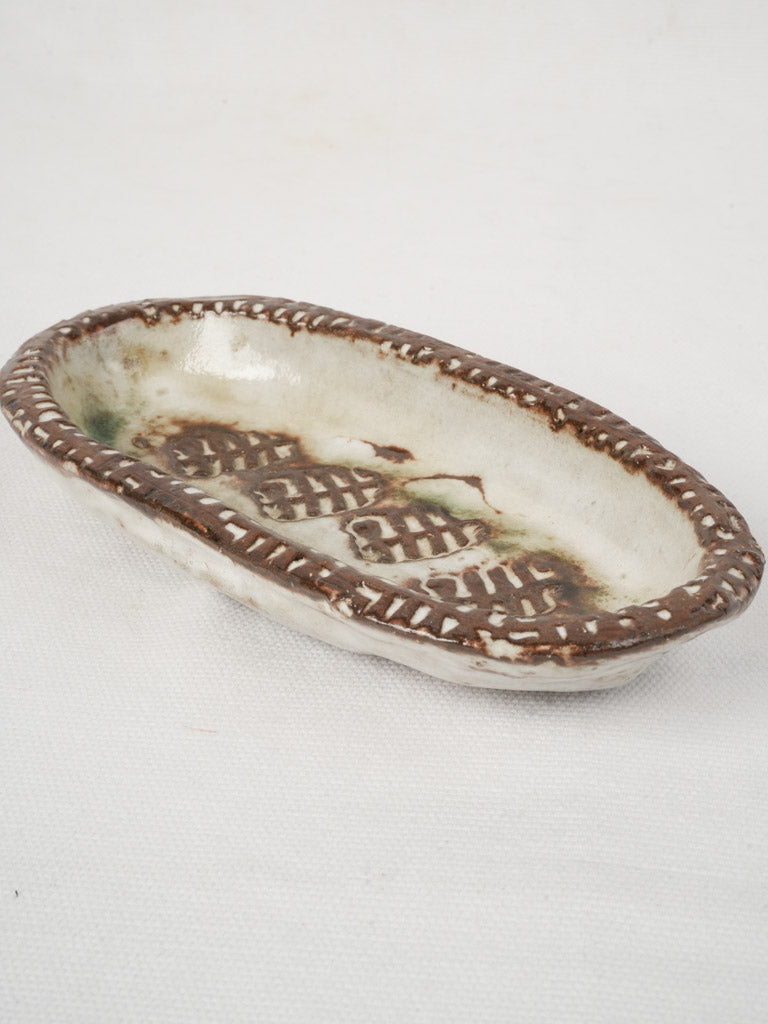 Textured green oval vide poche