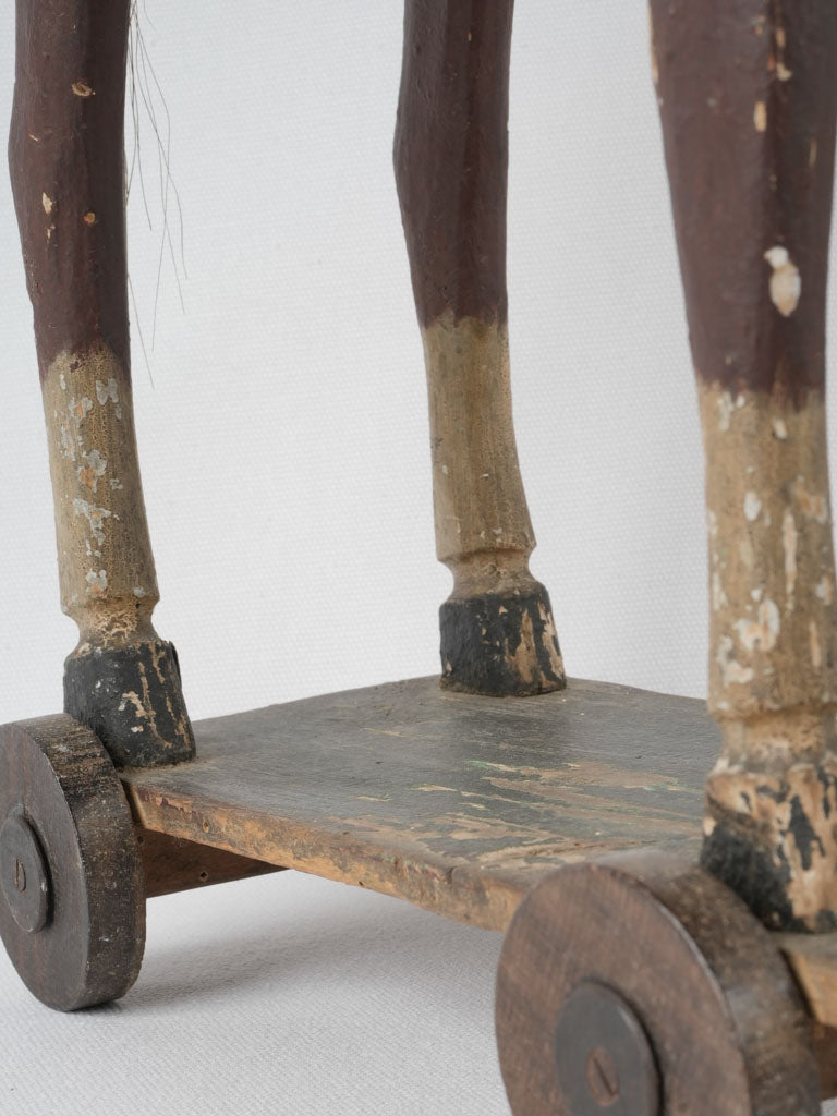 Aged, French wooden toy horse