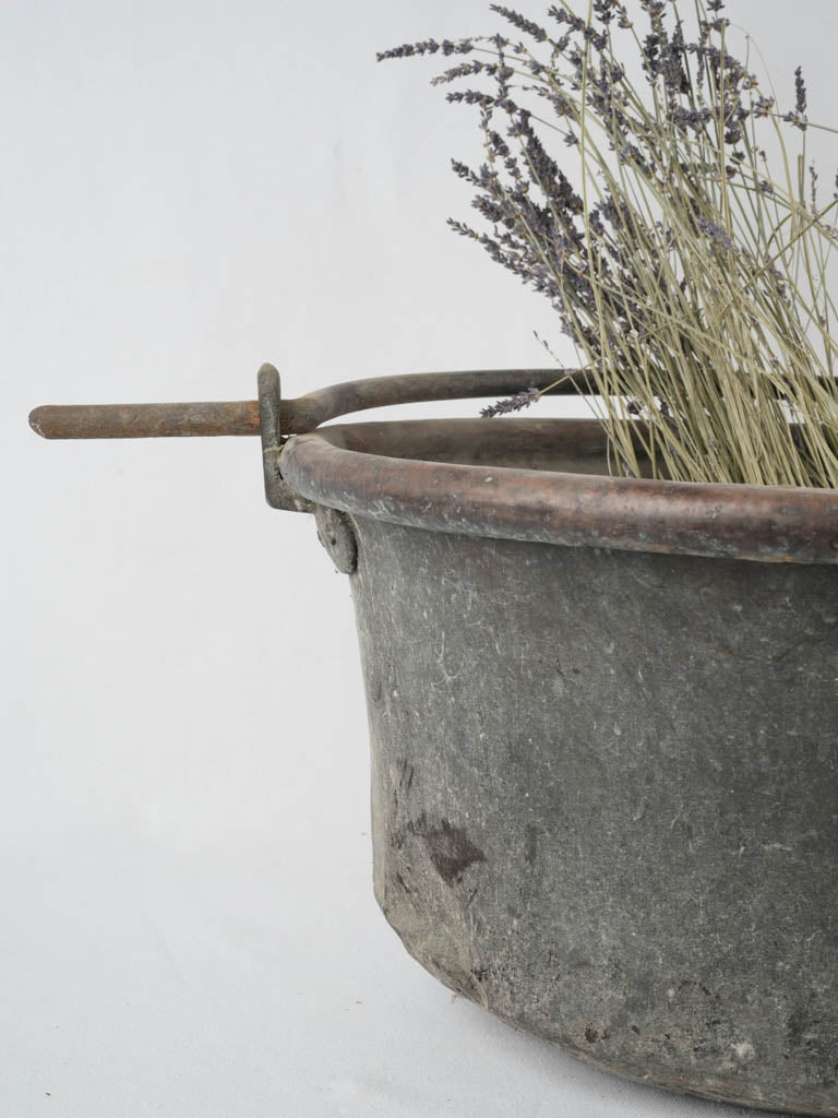 Well-worn copper wine domain cauldron