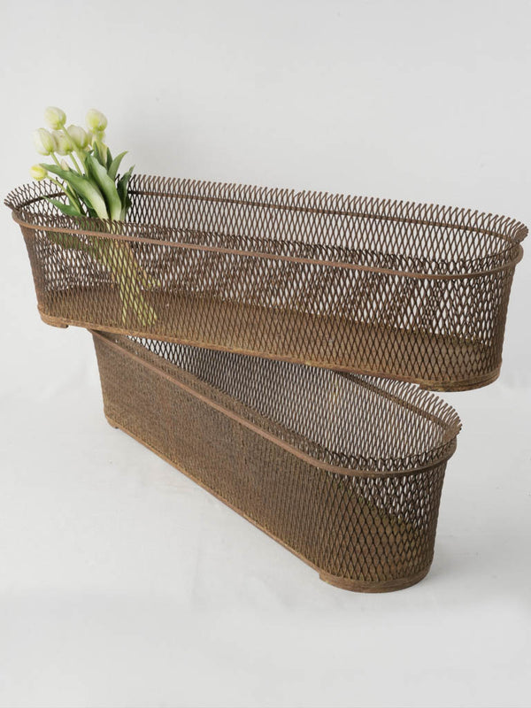 Patina-covered mid-century planters  