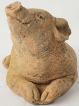 Elegant stone-crafted piglet sculpture