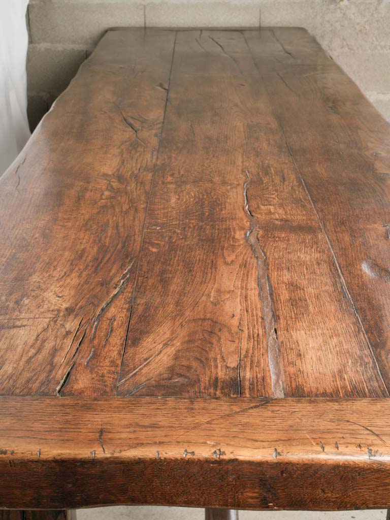 Traditional dark-stained oak dining table