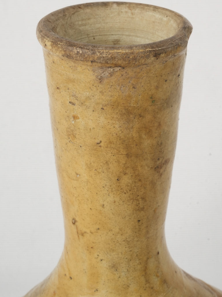 Elongated neck antique pottery bottle  