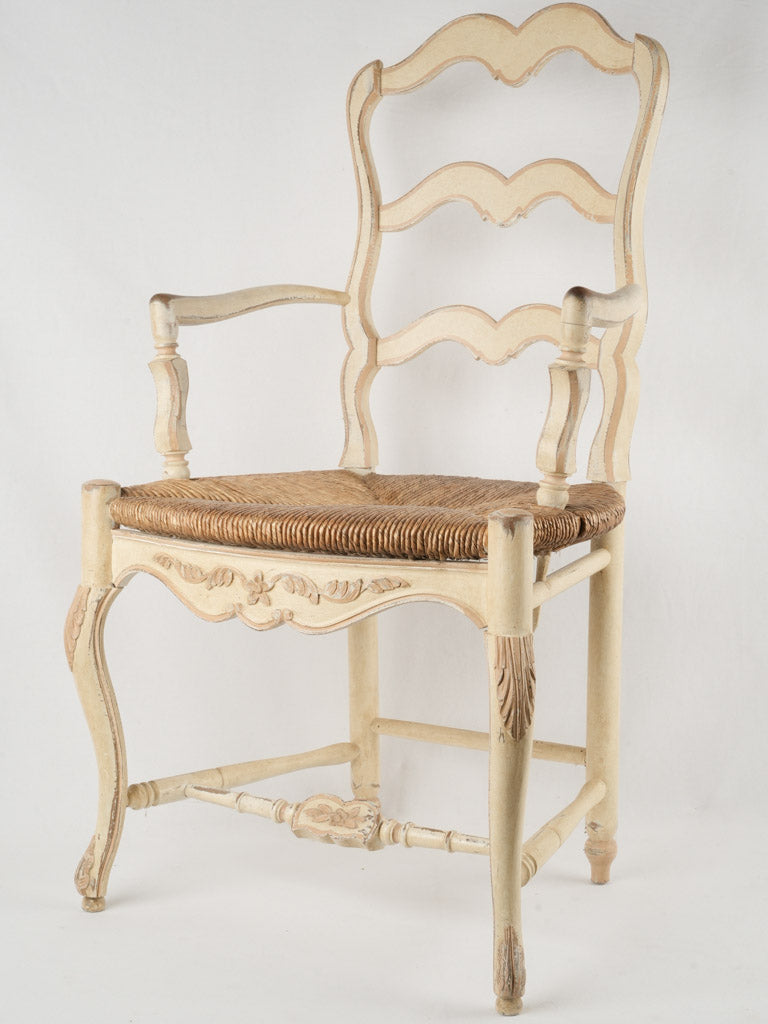 Weathered French rush seat armchair