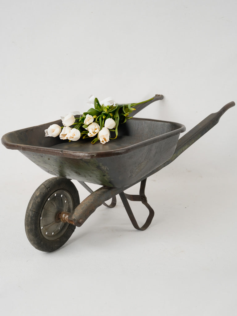 Vintage French metal toy wheelbarrow