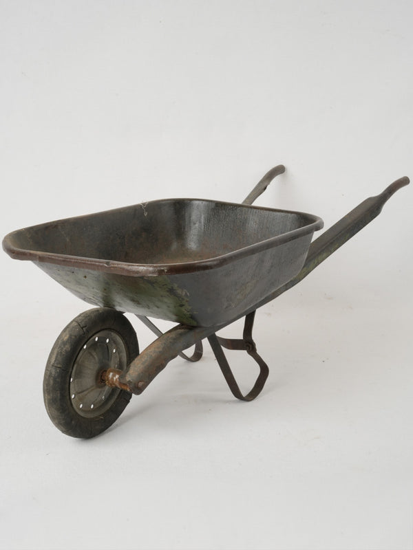 Charming retro playtime toy wheelbarrow