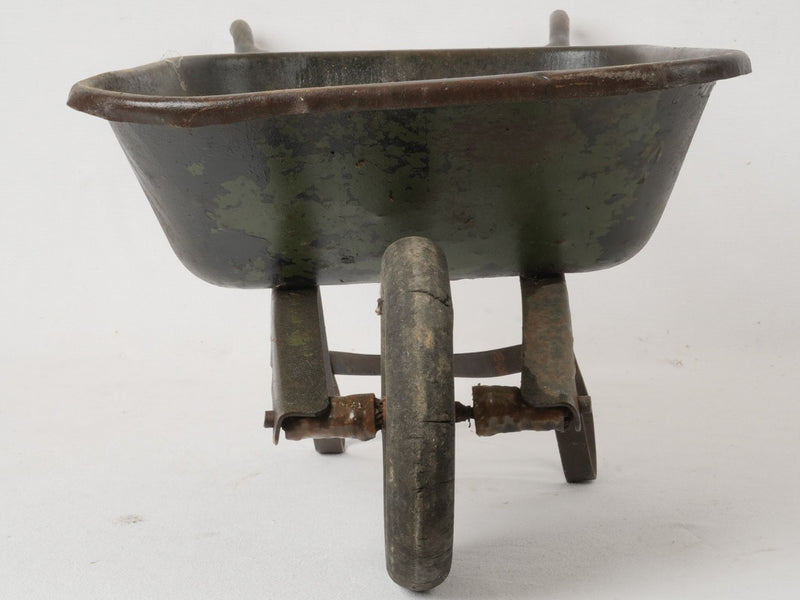 Patina-finished collectible French wheelbarrow