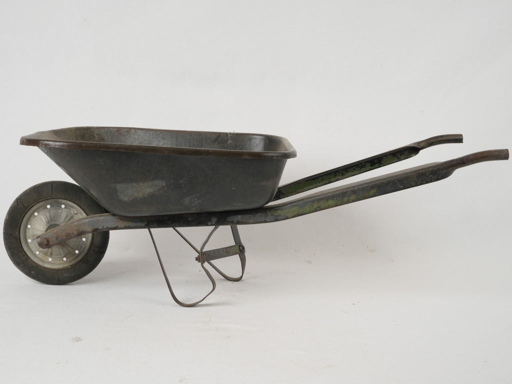 Mid-century garden-themed toy wheelbarrow