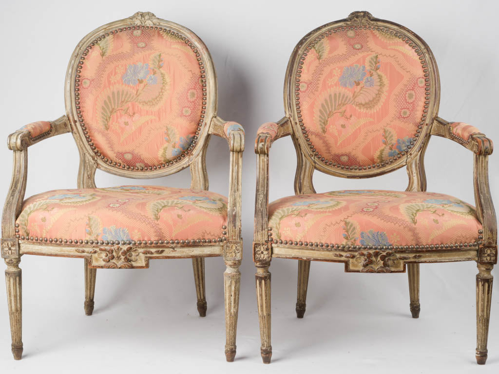 Ornate brocade upholstered medallion chairs