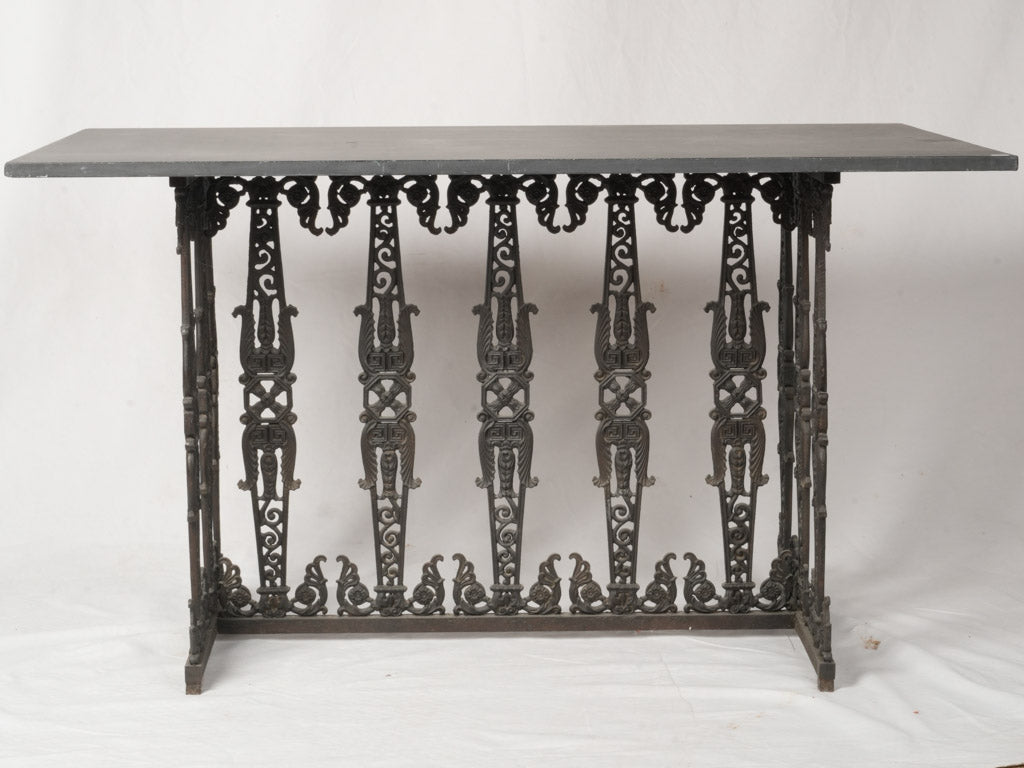 Intricate baluster base console  