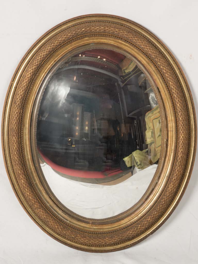 Antique French gilded convex mirror  