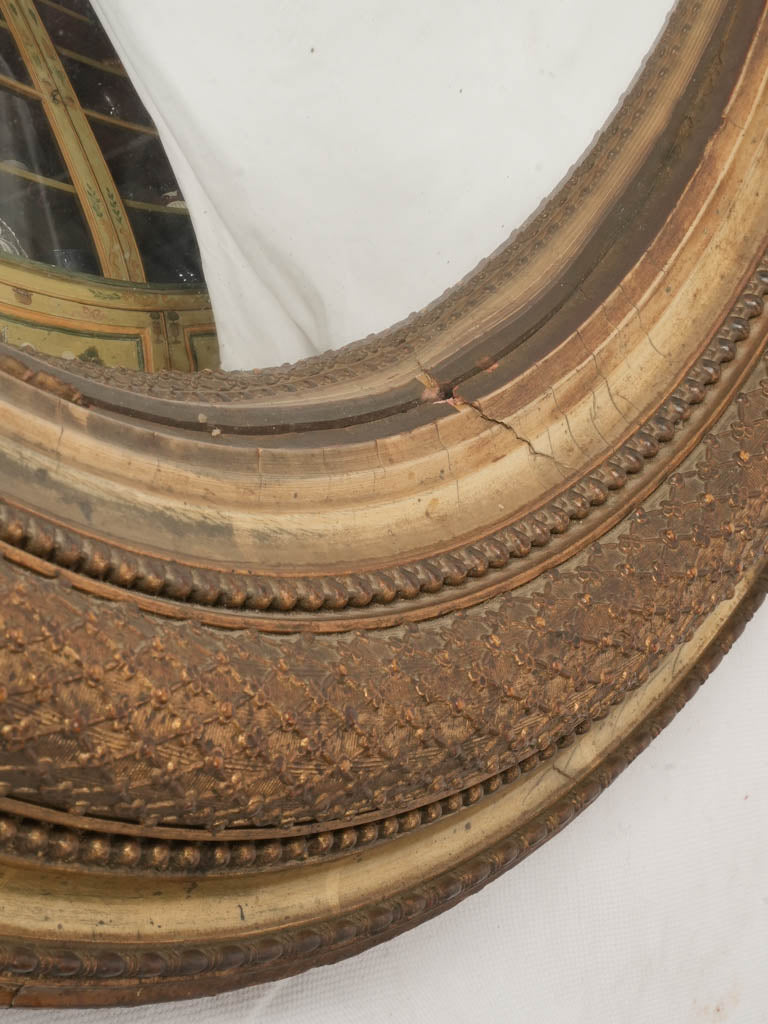 Finely engraved antique oval mirror  