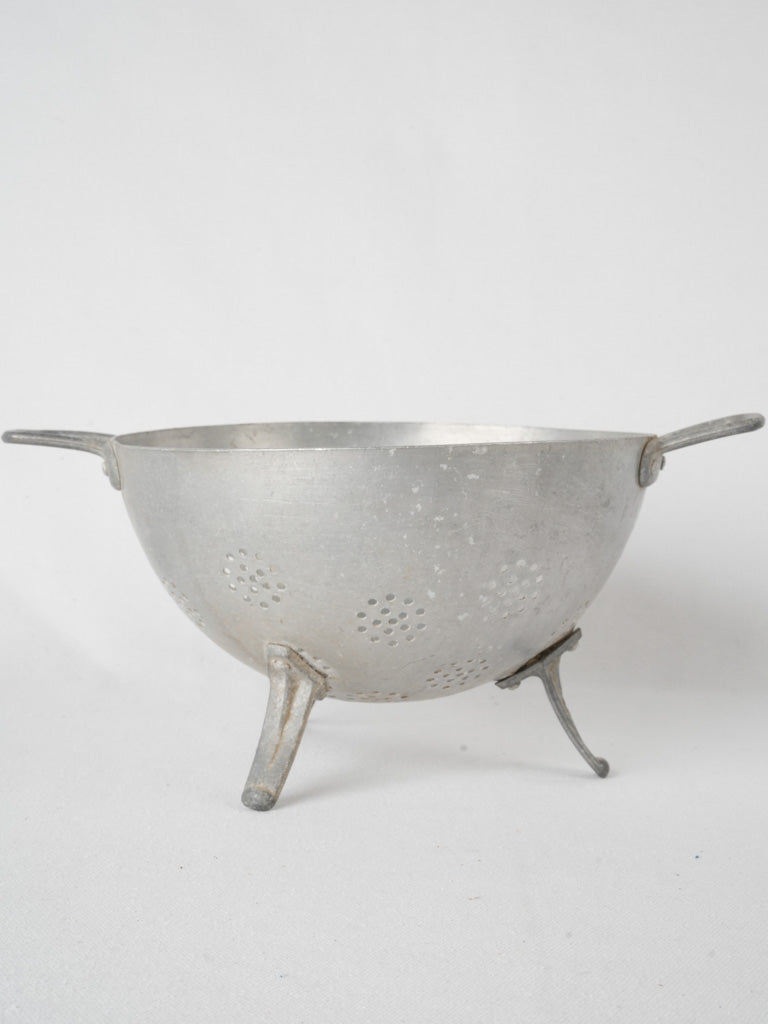 Charming timeworn French aluminum colander