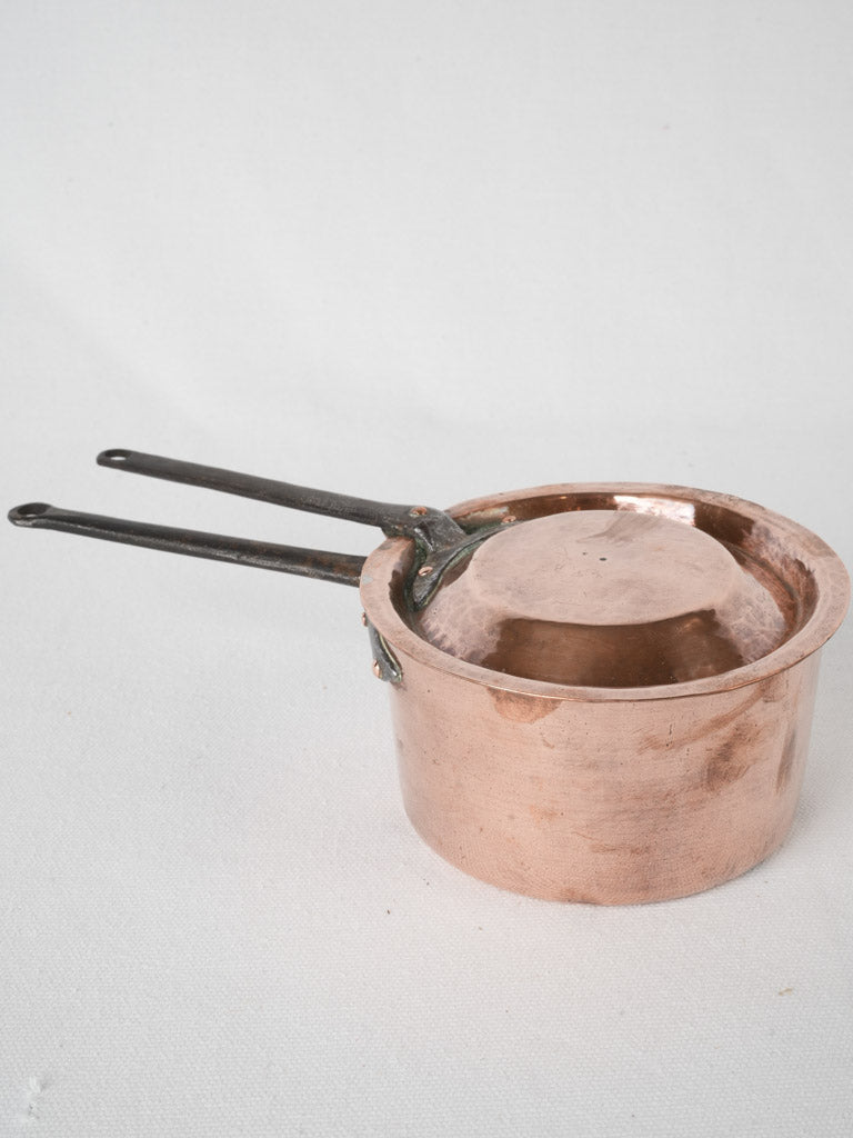 Vintage hand-hammered copper saucepan