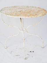 Rustic aged metal garden table