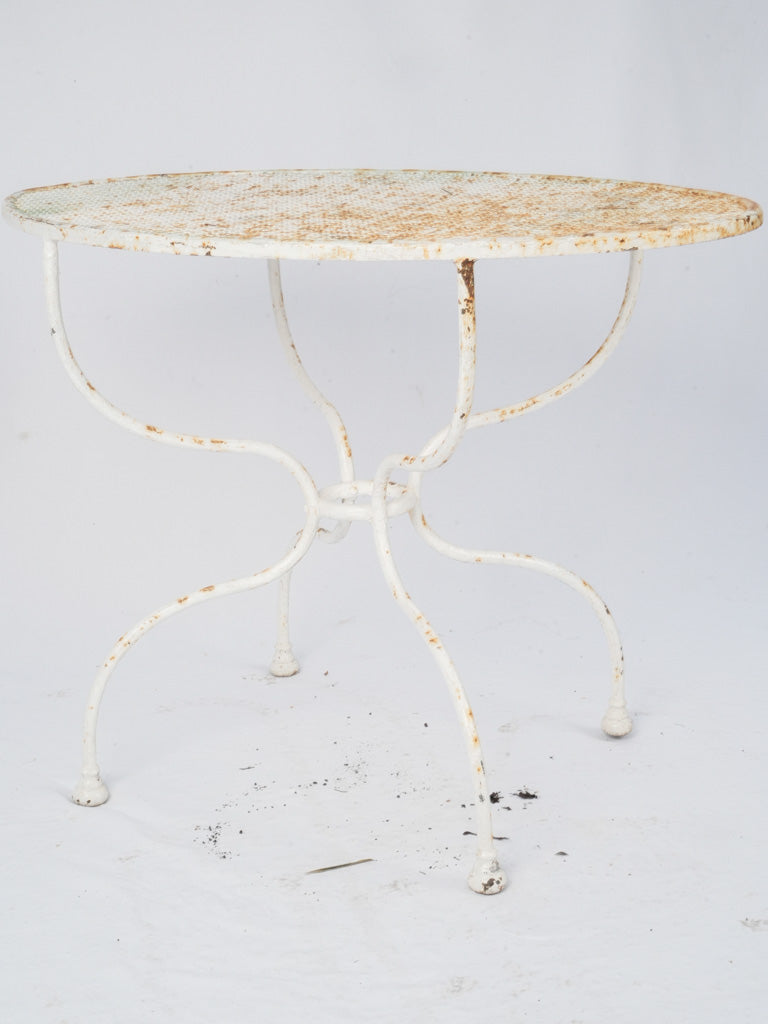 Weathered oval French outdoor table