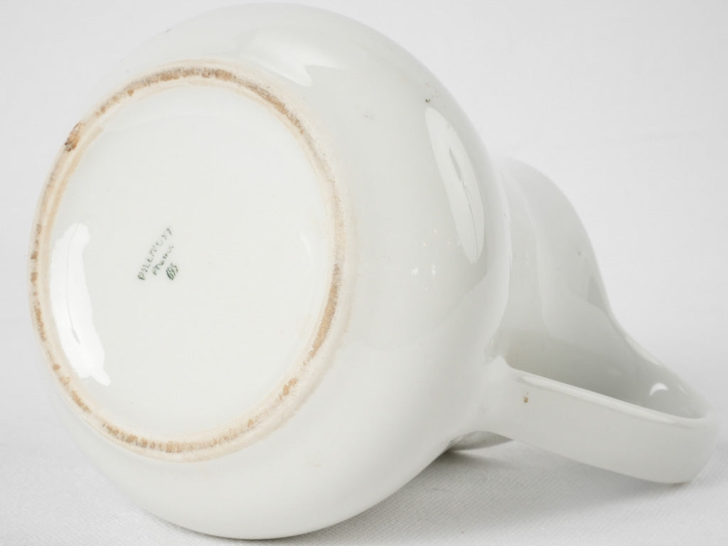 Historic French porcelain milk pitcher