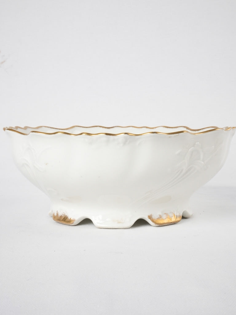 Late 19th century Limoges porcelain dinner service w/ gold border