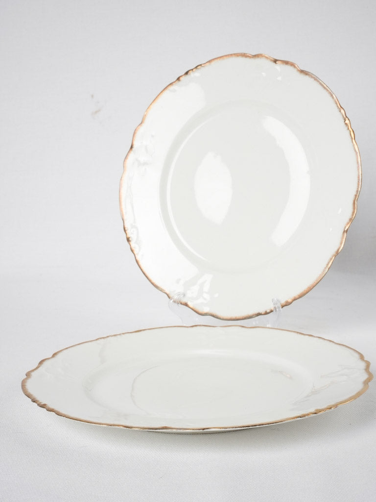 Late 19th century Limoges porcelain dinner service w/ gold border