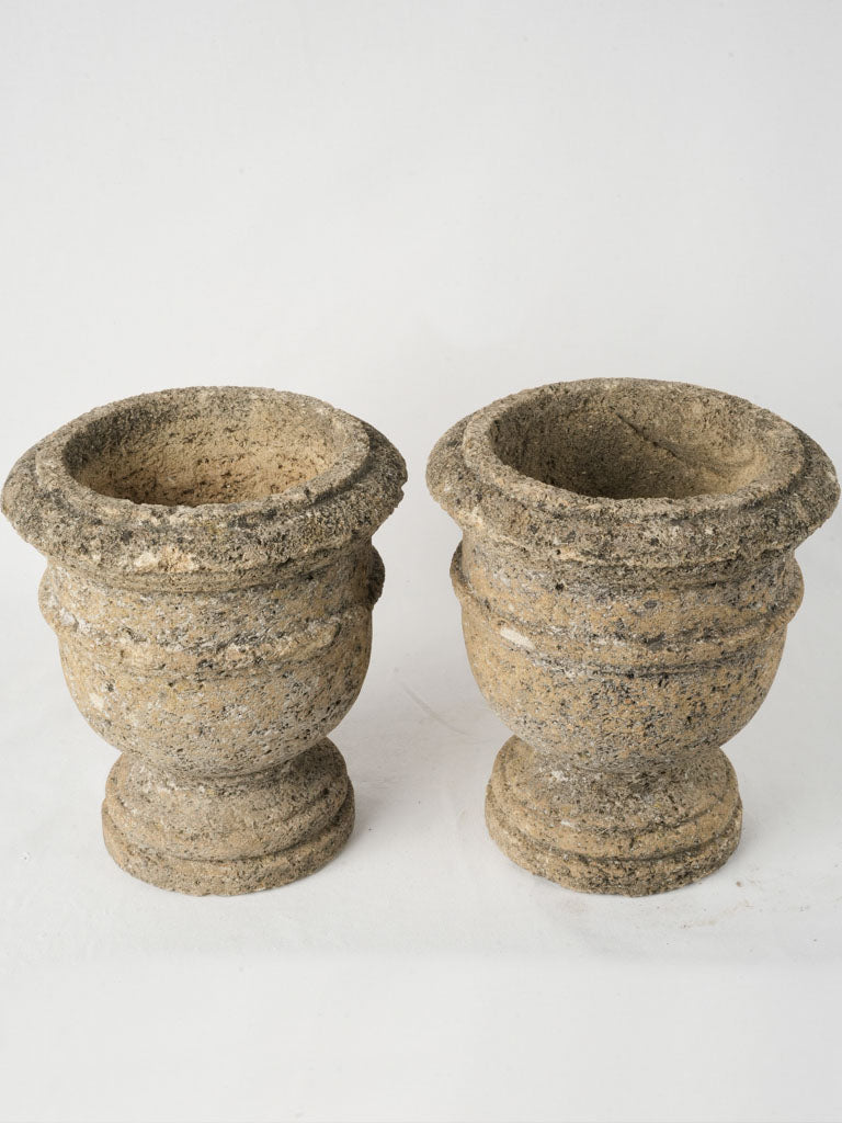 Timeworn small baluster urns