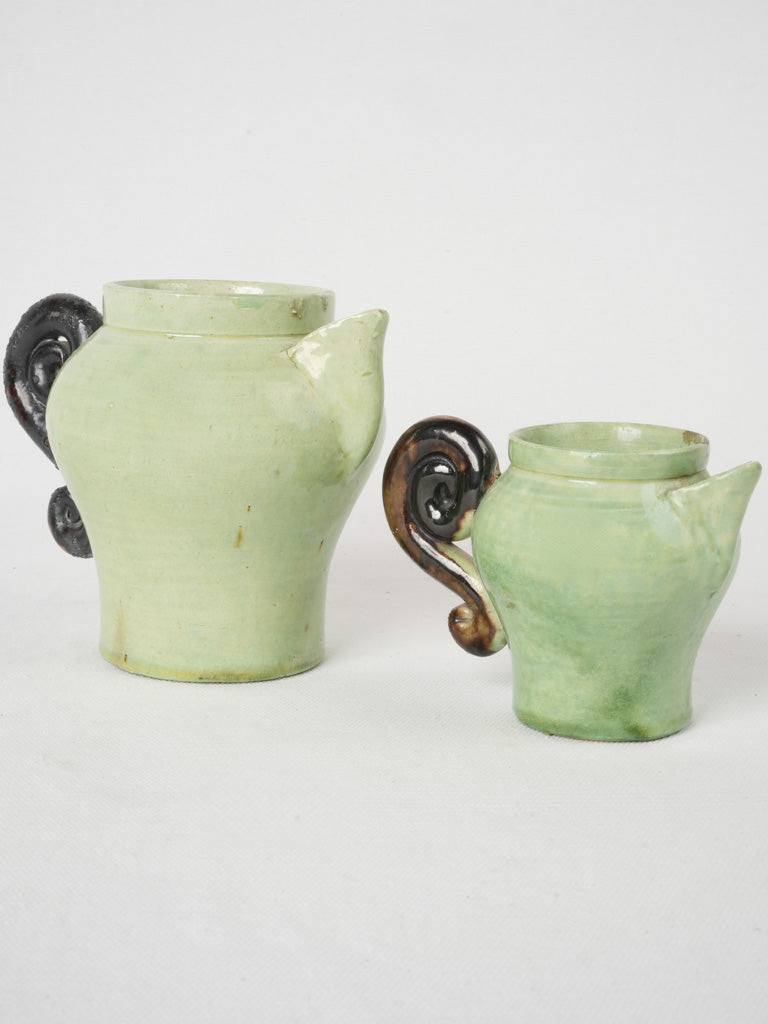 Unique pea green stoneware creamers